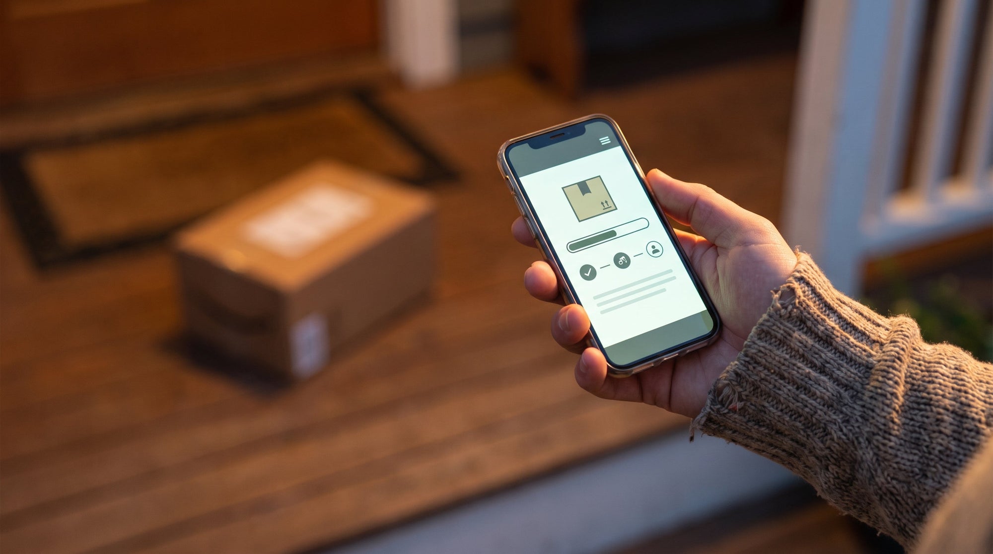 Customer checking order status on a smartphone, representing post-purchase order editing for Shopify merchants.
